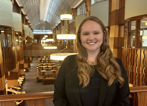 Mansfield poses in the Law Library